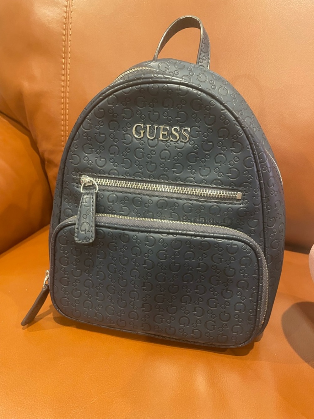 Guess Navy Blue Embossed Logo Mini Backpack with Silver Hardware